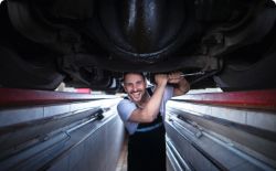 Mechanic doing rear beam repairing