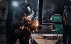 Close-up of a locksmith performing welding work