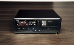 Tachograph before replacement, lying on a desk