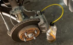 Brake fluid replacement in progress