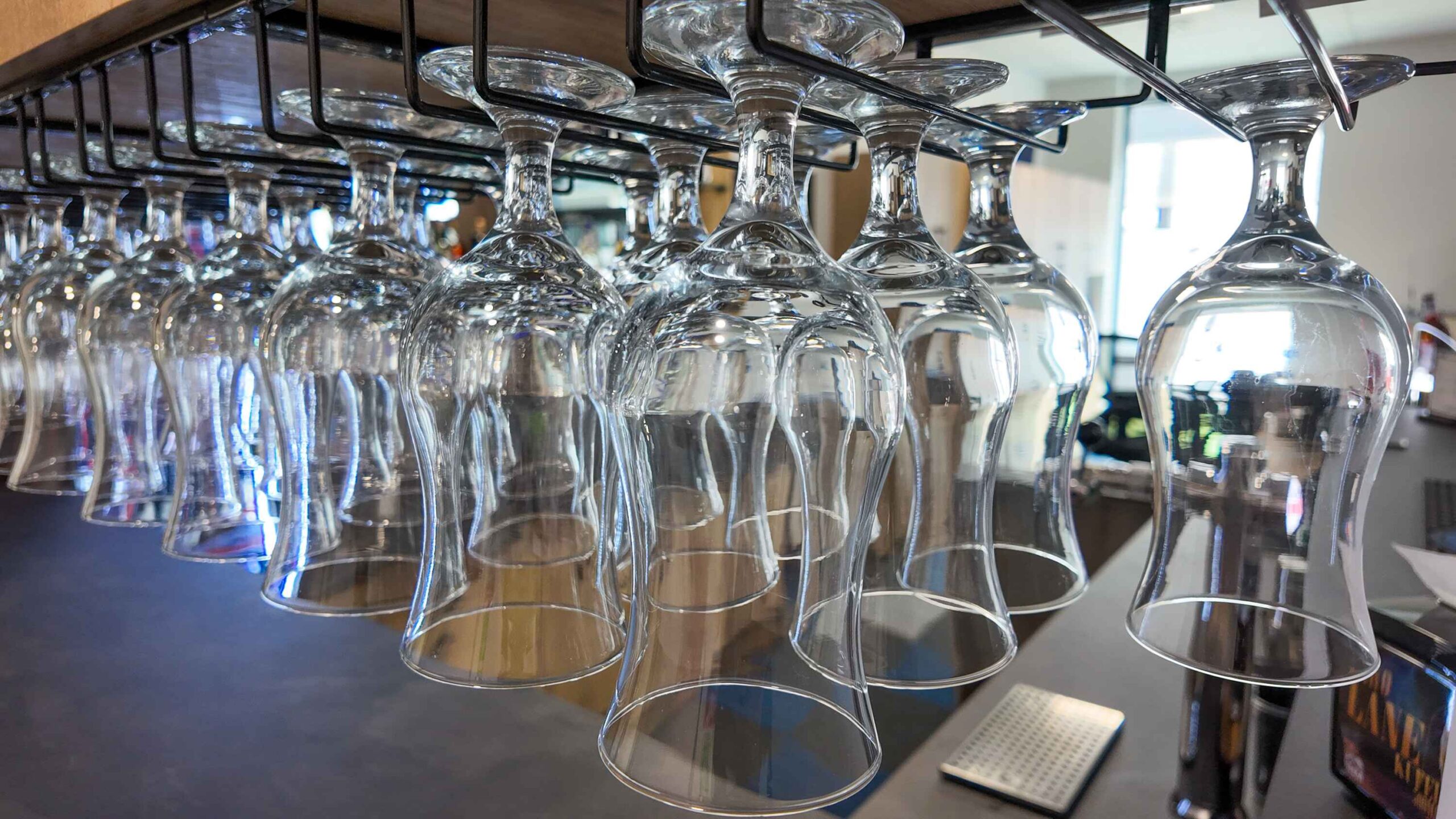 Cups hanging above the bar counter